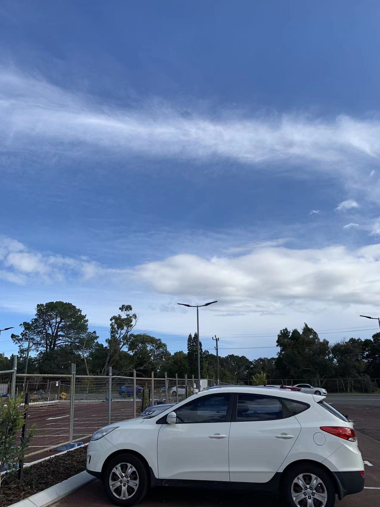 50W Sunpro solar street lights installed in a commercial parking lot in Australia
