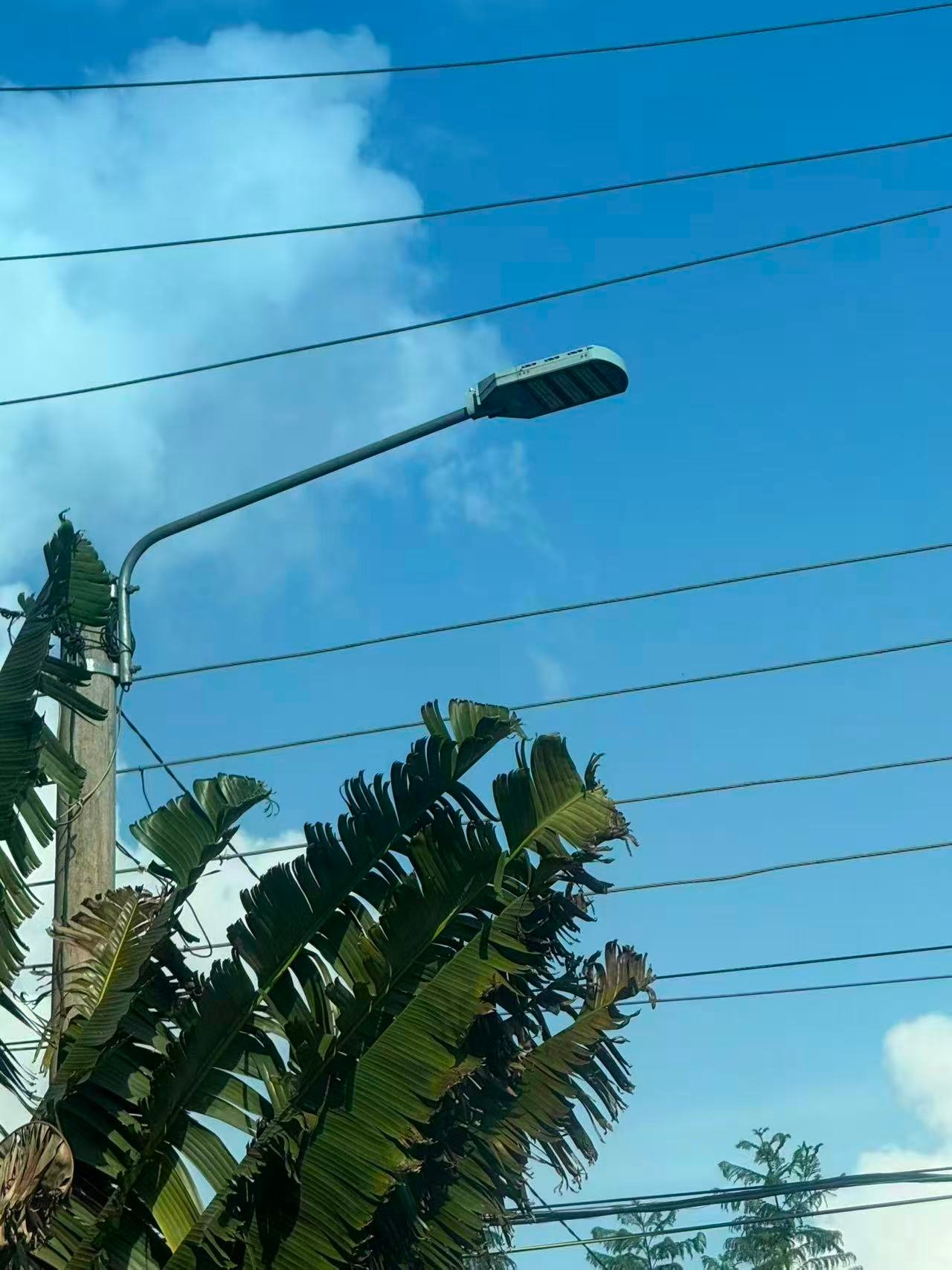 Close-up showing intact die-cast aluminum housing of LED street light after 7 years in Africa