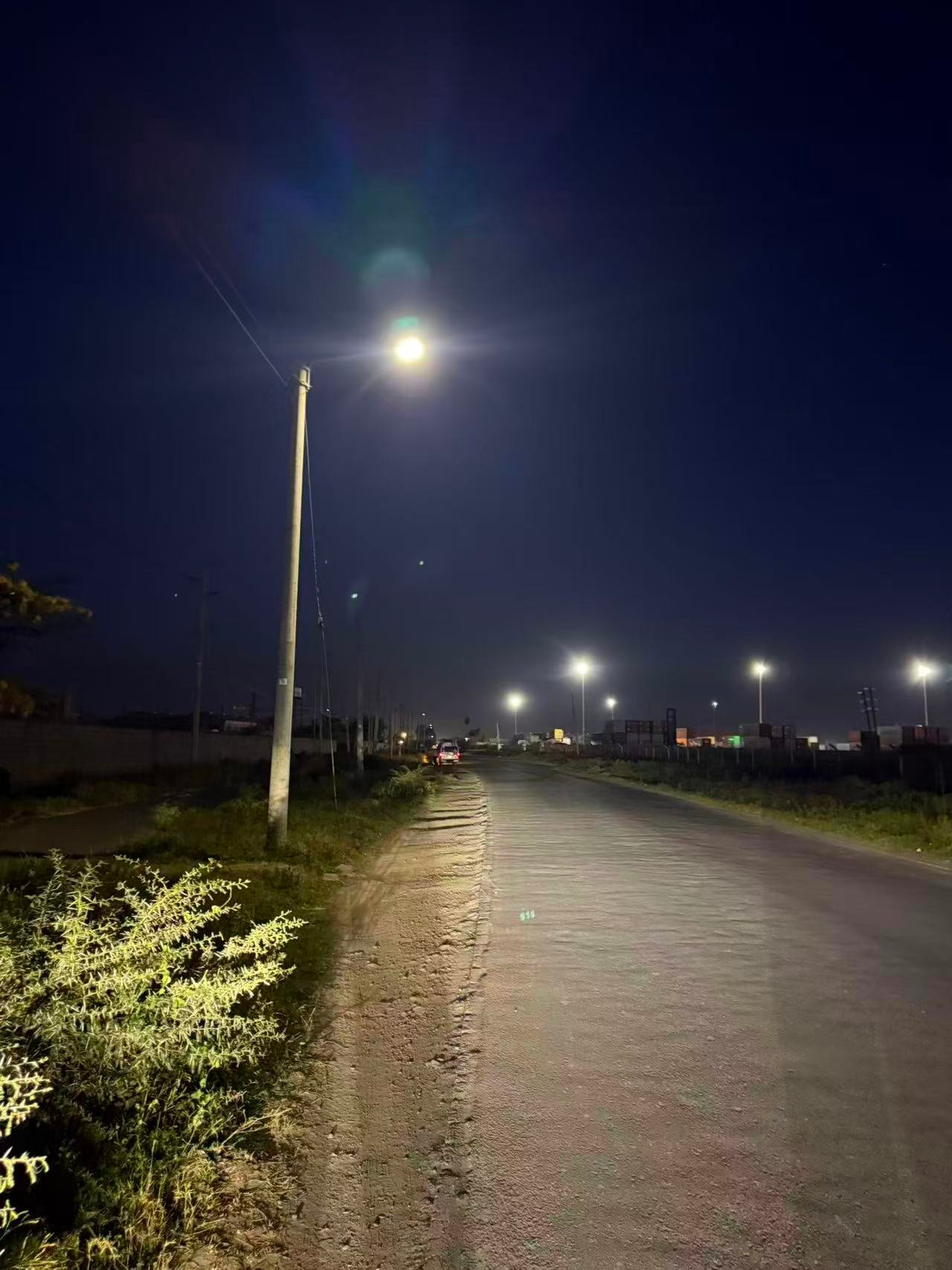 Bright night view of Kenya municipal road illuminated by Leyond LED street lights after 7 years