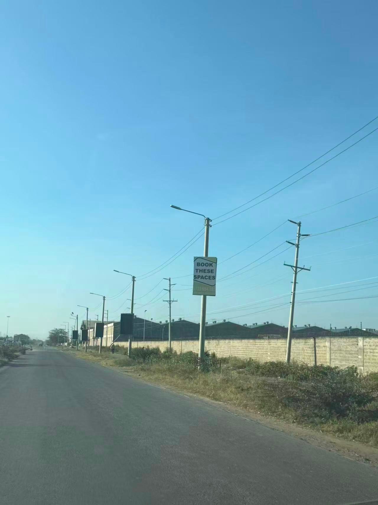 Daytime view of durable LED street lighting infrastructure in Kenya in 2025