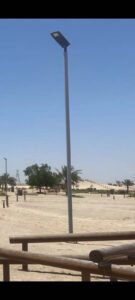 Leyond solar street light operating reliably in extreme desert heat, featuring an ADC12 die-cast aluminum housing and a custom black-painted stainless steel bracket for maximum anti-corrosion performance