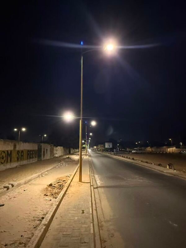 LED street light installation project in Senegal for municipal roadway lighting.