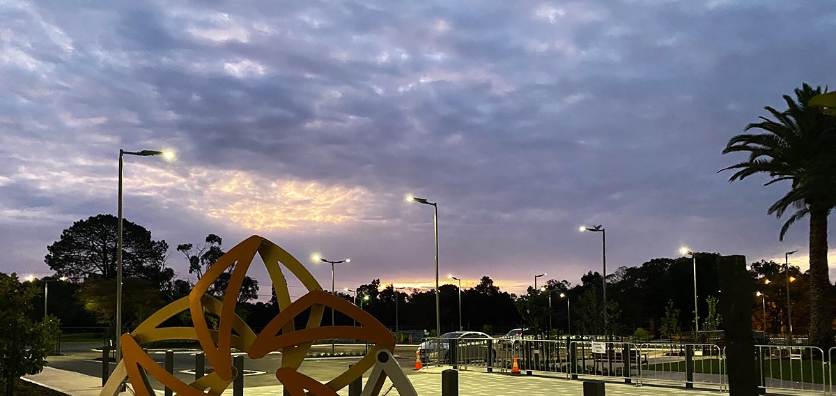 Aesthetic solar pathway lighting blending with landscape design at dusk.