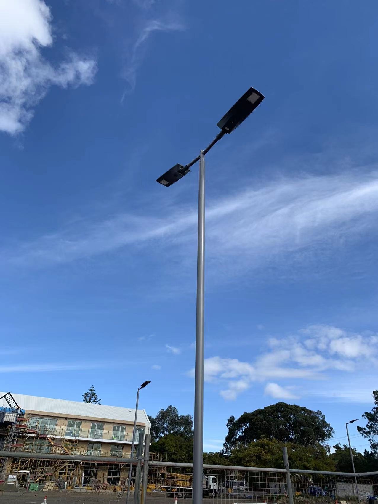 Twin-head configuration of Sunpro solar lights for wide area coverage